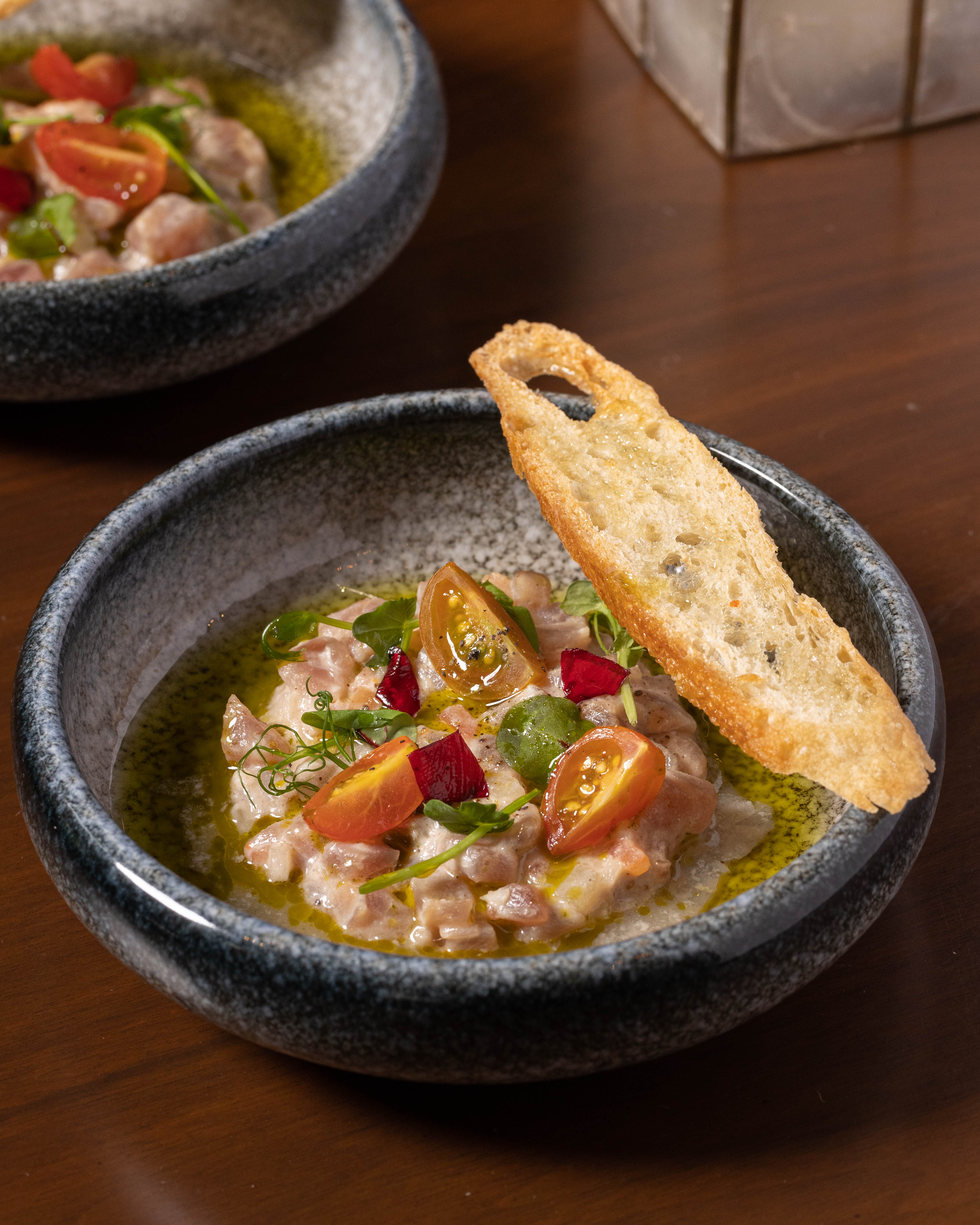 The second course, Hawak Kamay is Kinilaw na Isda with tuna, cucumber, radish, and vinegar. Clean and balanced, the dish reflects the ease that comes with familiarity, marking the moment trust begins