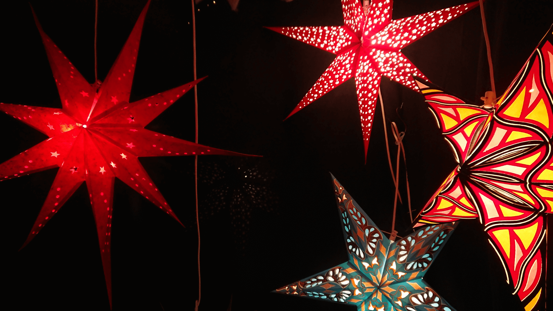 Four colorful Christmas lantern or parol