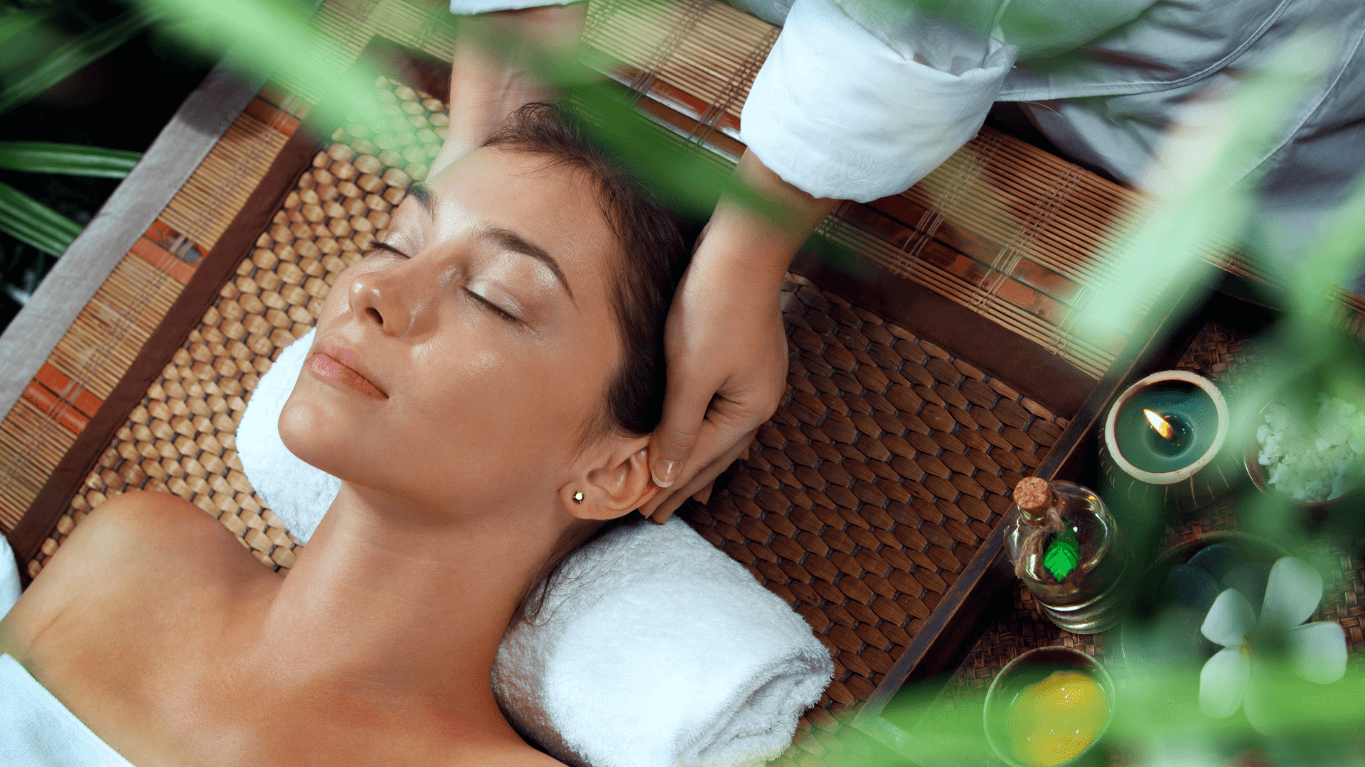 Girl receiving a head massage in a spa