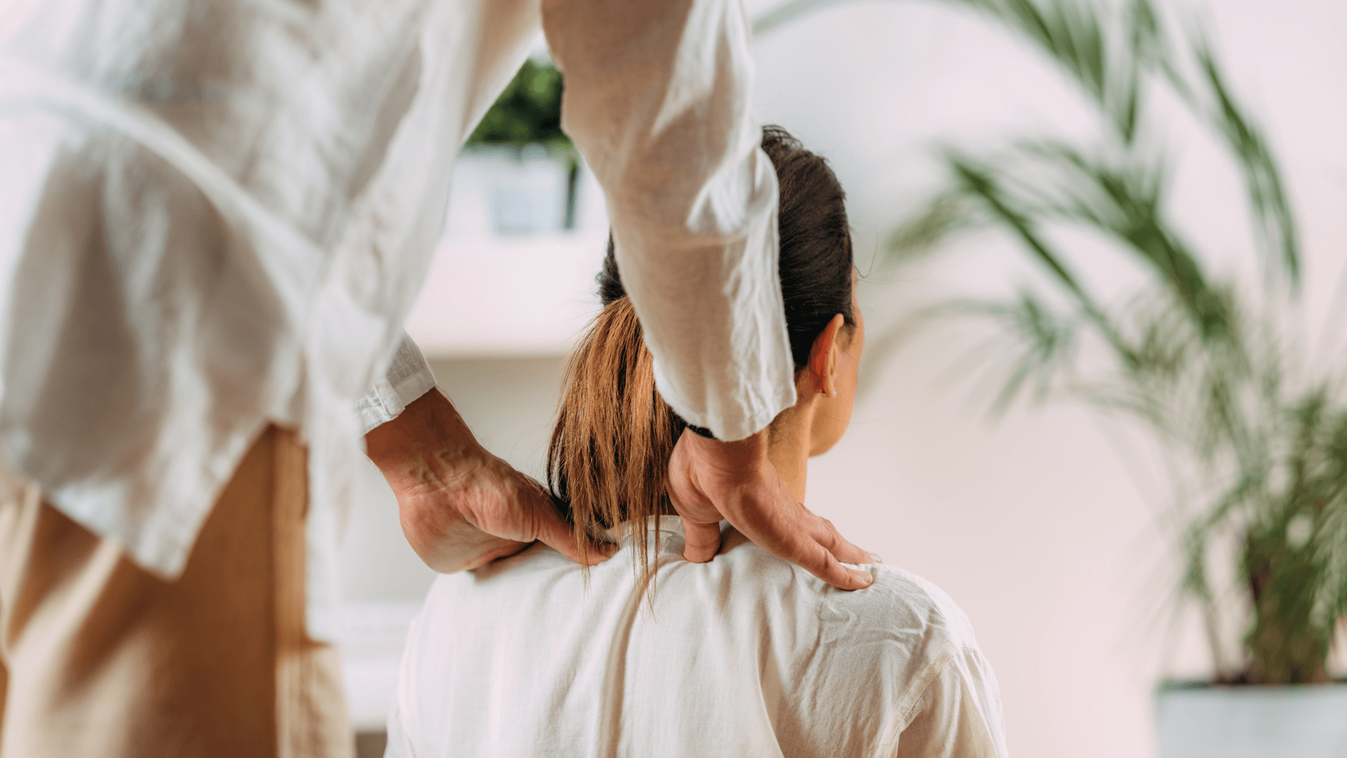 Masseur doing Shiatsu massage to his client