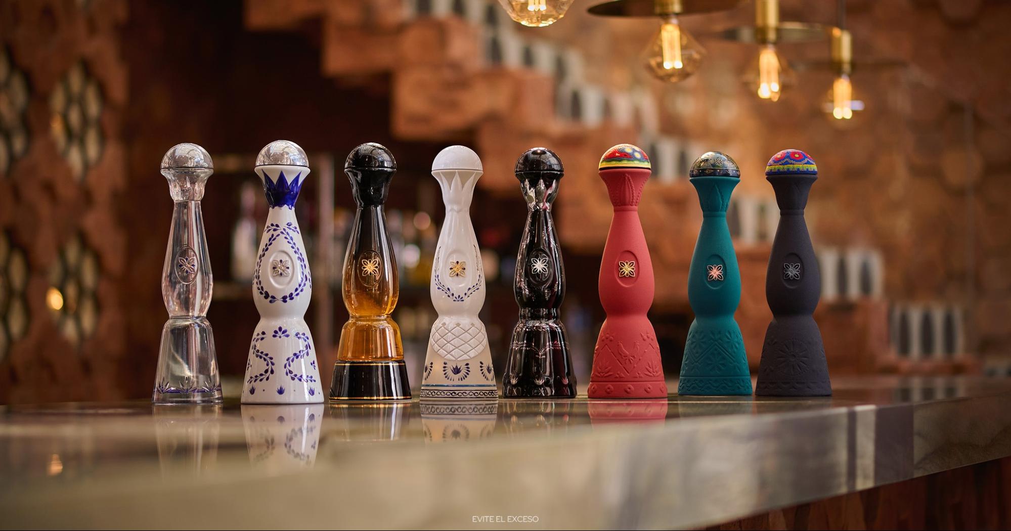 Different variants of Clase Azul tequila in ceramic bottles